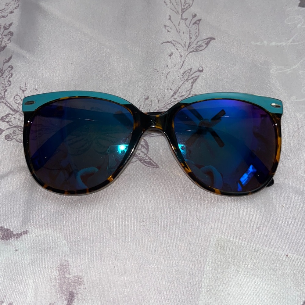 blue lensed sunglasses with blue rim